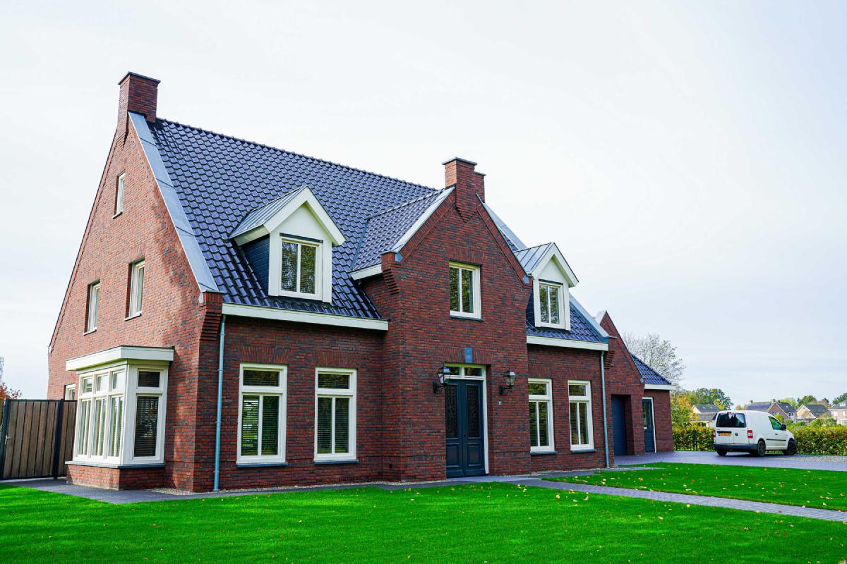 Nieuwbouw woonhuis en bijgebouw