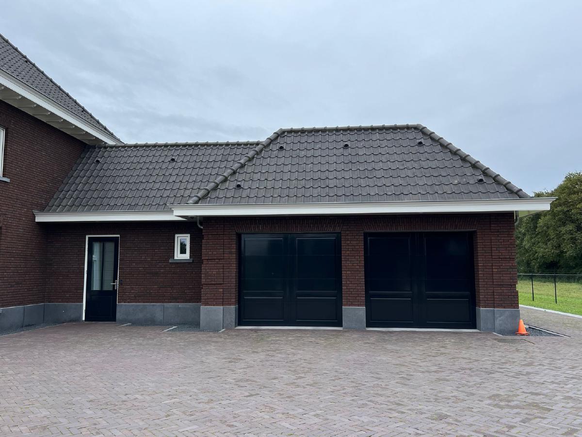 Nieuwbouw woonhuis en bijgebouwen